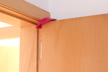 Load image into Gallery viewer, Blockystar Ovni DoorStop WindowStop Fuchsia