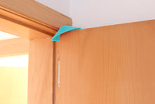 Load image into Gallery viewer, Blockystar Ovni DoorStop WindowStop Turquoise