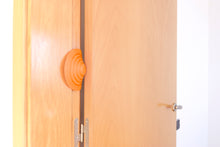Load image into Gallery viewer, Blockystar Ovni DoorStop WindowStop Orange