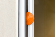 Load image into Gallery viewer, Blockystar Ovni DoorStop WindowStop Orange